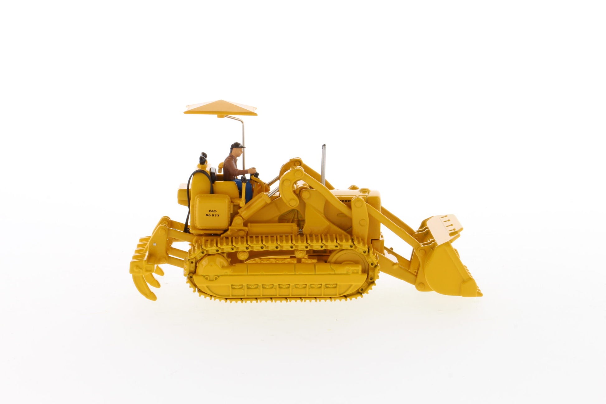 CAT 977D Traxcavator on display base