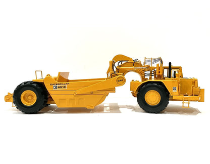 CAT 651E Scraper side view