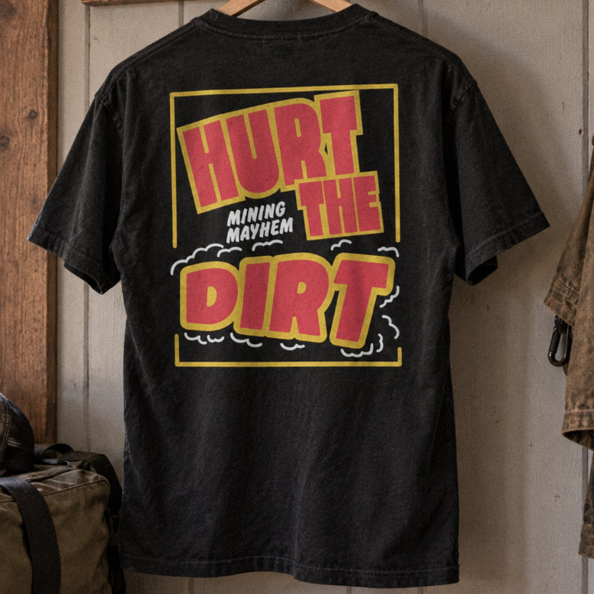 Hurt The Dirt tee hanging