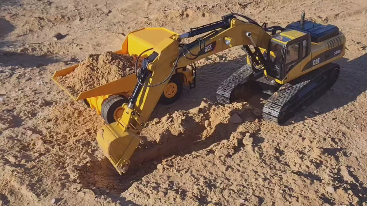 Load video: CAT RC excavator loading a truck